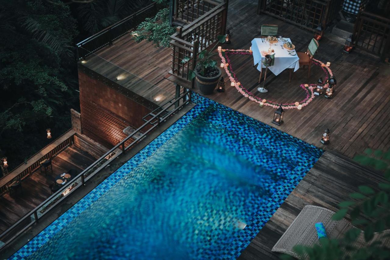 The Sebali Resort Убуд Екстер'єр фото The swimming pool at the hotel